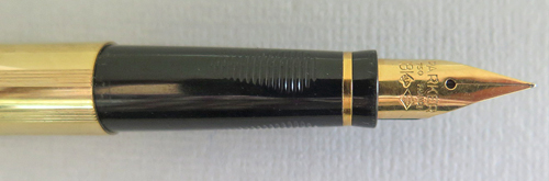 #3888: GOLD PLATED PARKER 75 WITH MEDIUM/FINE 18K GOLD PARKER NIB. NO DENTS, DINGS OR BRASSING. Comes with Paker piston converter