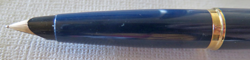 6427: PARKER 45 USA MADE IN DARK BLUE. BRUSHED STAINLESS CAP WITH GOLD PLATED TRIM. BROAD 14K NIB