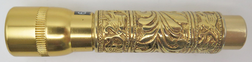 ITEM #2479: GOLD PLATED FLASHLIGHT WITH VICTORIAN REPOUSSE WORKMANSHIP. Twist actuated to turn on/off. Light works. Uses AAA battery