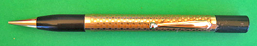 ITEM #3094: NO NAME GOLD PLATED CIGARETTE LIGHTER/PENCIL. Working pencil uses size .046" lead. There is a small hairline crack in the cover of the lighting mechanism, but lighter works.