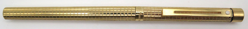 ITEM #4813: SHEAFFER TARGA SLIM FOUNTAIN PEN. 14K GOLD ELECTROPLATED SQUARE PATTERN ON BARREL, CAP & TRIM. INLAID 14K NIB IN MEDIUM MARKED 585