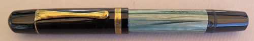 5408: PELIKAN 100 N WITH VERY FLEXIBLE MEDIUM NIB IN 14K GOLD. BLACK CAP WITH GREEN STRIPED BINDE WITH GOLD FILLED TRIM