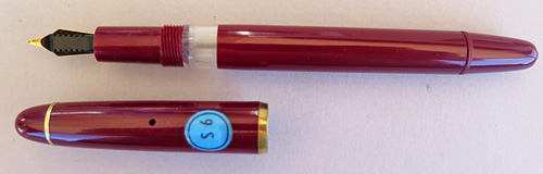 SOENNECKEN PISTON FILLER, IN BURGUNDY FOUNTAIN PEN WITH BROAD FLEX NIB. NEW OLD STOCK. NEVER INKED