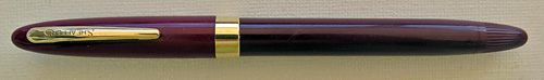 6193: SHEAFFER SARATOGA SNORKEL IN BURGUNDY WITH A TWO-TONE GOLD OPEN ACCOUNTANT X-FINE NIB