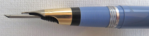 This Snorkel has a linned stainless steel cap with 3/16" gold filled band and blank gold filled clip and a white dot.