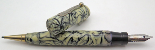 ITEM #6407: WELSH BLACK/CREAM SWIRL COMBO FOUNTAIN PEN/PENCIL. TRADITIONAL WEDDING CAKE DOME ON CAP. LEVER FILLER FOUNTAIN PEN. NIB IS WELSH SS IN FINE. PENCIL MECHANISM WORKS IN BOTH DIRECTIONS.