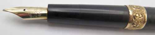 ITEM #6444: RARE WATERMAN EYEDROPPER 16 FOUNTIAN PEN IN BLACK CHASED HARD RUBBER. STONG CHASING AND NO BROWING ON SURFACE. IDEAL NEW YORK #6 FLEXIBLE 14K NIB IN FINE/MEDIUM. TWO GOLD FILL HAND-WORKED BANDS.