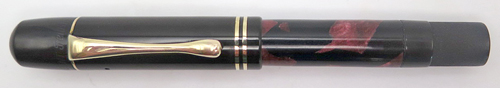 ITEM #6445: PELIKAN FANTASY 100 WITH BURGANDY MARBLE BINDE. FLEXIBLE FINE 14K NIB. GREEN PELIKAN IMPRINT ON THE TASSIE. 14K GOLD FILL TRIM.