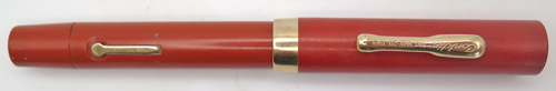 ITEM #6459: CONKLIN ORANGE ENDURA TOLEDO FOUNTAIN PEN. SPRING CLIP AND GOLD FILL TRIM. NIB IS "CONKLIN #4 TOLEDO" IN BROAD