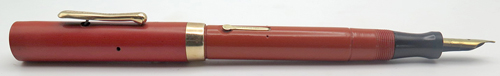 ITEM #6459: CONKLIN ORANGE ENDURA TOLEDO FOUNTAIN PEN. SPRING CLIP AND GOLD FILL TRIM. NIB IS "CONKLIN #4 TOLEDO" IN BROAD