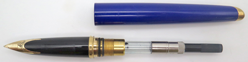 ITEM #6477: FRENCH MADE WATERMAN BLUE CARENE FOUNTIAN PEN IN ABYSS BLUE. BROAD 18K NIB. INCLUDES WATERMAN PISTON CONVERTER. EXCELLENT CONDITION. WITH BOX
