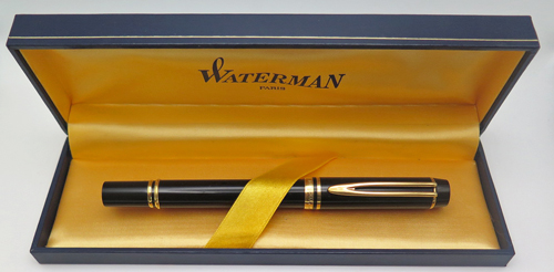 ITEM #6479: WATERMAN LEMANN 100 IN BLACK. "IDEAL" 2TONE 18K WATERMAN NIB IN MEDIUM. SMOOTH, NO CHASING. INCLUDES PISTON CONVERTER. In box.