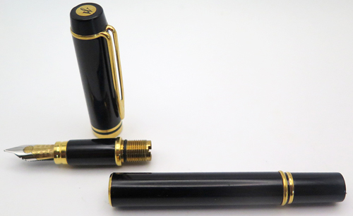 ITEM #6480: FRENCH MADE WATERMAN LEMANN 100 IN BLACK. BROAD 2TONE "IDEAL" WATERMAN NIB IN 18K. INCLUDES PISTON CONVERTER. With box & papers