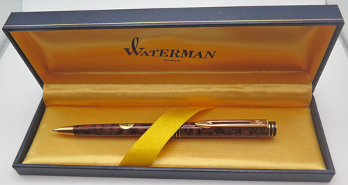 ITEM #6488: FRENCH MADE WATERMAN EXCLUSIVE PENCIL IN BROWN MARBLE. CAP ACTUATED. With "MADE IN FRANCE" origional sticker. In box with papers