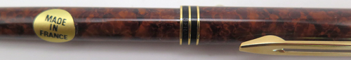 ITEM #6488: FRENCH MADE WATERMAN EXCLUSIVE PENCIL IN BROWN MARBLE. CAP ACTUATED. With "MADE IN FRANCE" origional sticker. In box with papers
