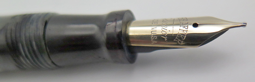 ITEM #6631: SHEAFFER JUNIOR FOUNTAIN PEN IN MARBLED BLACK/GREY. LEVER FILLING UNIT. GOLD, BROAD NIB WITH "SHEAFFER JUNIOR" IMPRINT.
