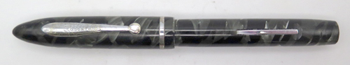 ITEM #6631: SHEAFFER JUNIOR FOUNTAIN PEN IN MARBLED BLACK/GREY. LEVER FILLING UNIT. GOLD, BROAD NIB WITH "SHEAFFER JUNIOR" IMPRINT.