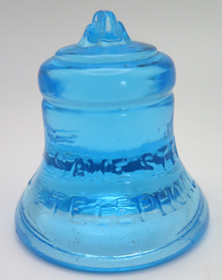 ITEM #6666: SENGBUSCH HANDIPEN PLASTIC BLACK INKWELL + PEN STAND WITH UNIQUE BLUE GLASS BELL. BELL PHONE SYSTEMS EMPLOYEE OFFICE ISSUED. PEN STAND STATES "PROPERTY OF BELL SYSTEMS". NEW OLD STOCK IN ORIGINAL GREEN PACKAGING WITH INSTRUCTIONS. BLUE GLASS BELL SAYS "SAVE TIME SAVE STEPS". PEN IS EXTRA FINE.