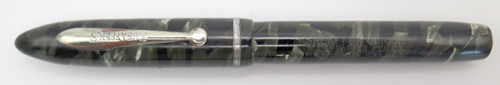 ITEM #6702: SHEAFFER JUNIOR FOUNTAIN PEN IN GREY/GREEN/BLACK MARBLE. CHOME TRIM. NIB IS MEDIUM WITH STAMPED "SHEAFFER JUNIOR MADE IN USA".