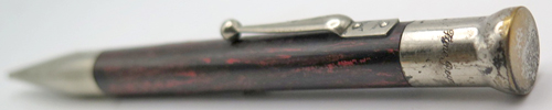 ITEM #6727: FYNE POYNT PENCIL IN ROSEWOOD. NICKEL TRIM. MECHANISM INOPERATIVE. 
