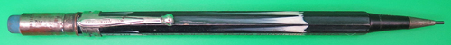 ITEM #6739: RITE RITE WOODEN MECHANICAL PENCIL IN NAVY/WHITE. NICKEL PLATED TRIM. ERASER IN GOOD CONDITION. "ODESSA INSURANCE OFFICE - GEORGE SCHIEWE" engraved on side. 