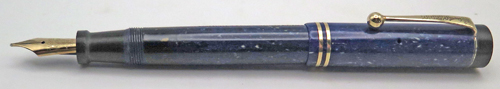 ITEM #6760: PARKER DUOFOLD JR LUCY CURVE FOUNTAIN PEN IN LAPIS WITH WHITE FLECKS. FLAT TOP. FLEXIBLE BROAD NIB IS INSCRIBED "PARKER DUOFOLD PEN MADE IN USA." GOLD FILLED TRIM. NO BRASSING. BUTTON FILLER.