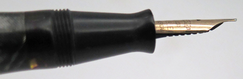ITEM #6764: WHAL EVERSHARP AIRLINER DORIC IN SILVER & BLACK SHELL. NICKEL PLATED TRIM. "EVERSHARP 18k FLEXIBLE" NIB IN FINE. THIS 12 FACETED BARREL HAS CRISP IMPRINT READING "UNITED STATES OF AMERICA". 