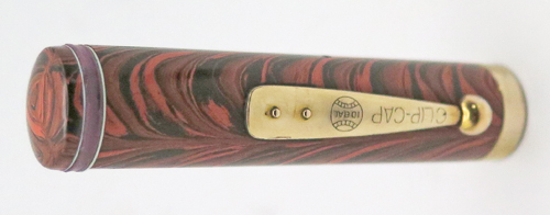 ITEM #6774: WATERMAN FOUNTAIN PEN #7 IN RED RIPPLE. "PINK" COLOR CODED NIB WHICH INDICATES A FLEX NIB. KEYHOLE BREATHER HOLE IN MEDIUM NIB. LEVER FILLER. CLEAR IMPRINT. 