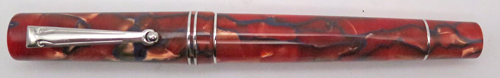 ITEM #6778: DELTA SANTA FE IN RED PEARL MARBLE WITH BLACK VEINS. DOUBLE BAND ON CAP. SILVER COLORED TRIM. EDITION XVII SERIALIZED LIMITED EDITION, NUMBERED 36/40. 