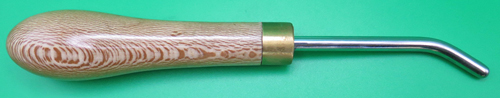 ITEM #D27: HEAVY DUTY BURNISHER. SMOOTH STAINLESS STEEL BURNISHER WITH ROUNDED ENDPOINT. WOODEN HANDLE FOR EXERTING MAXIMUM FORCE ON THE WORK PIECE. 