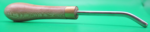 ITEM #D27: HEAVY DUTY BURNISHER. SMOOTH STAINLESS STEEL BURNISHER WITH ROUNDED ENDPOINT. WOODEN HANDLE FOR EXERTING MAXIMUM FORCE ON THE WORK PIECE. 